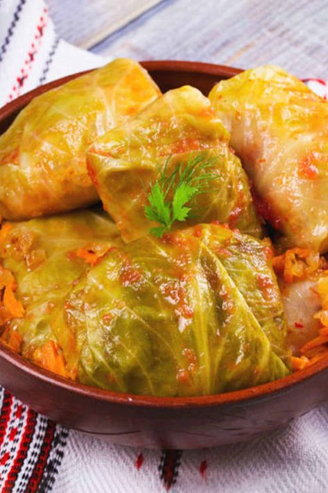 Serbian cuisine is one of the most delicious and nutritious ones across the globe, while one of the most popular, economic, and mouthwatering dishes from this country is certainly – Serbian sarma. What you should know right away, however, is that the most authentic Serbian sarma recipe consists of two parts, and the first one ... Sarma Recipe Serbian, Sarma Recipe, Sour Cabbage, Fresh Horseradish, Cabbage Head, Wheat Recipes, Serbian Recipes, Ground Meat, Smoked Bacon