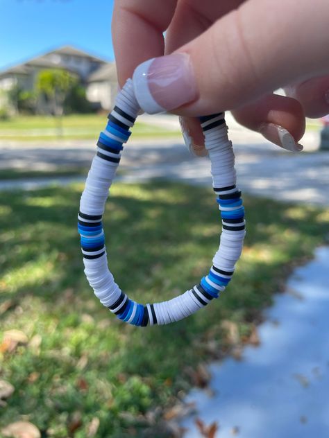 Black, white, medium blue, and light blue clay beaded bracelet Manly Clay Bead Bracelets, Clay Bead Bracelet For Boyfriend, Surfer Clay Bead Bracelets, Clay Bead Bracelet Ideas White, Men’s Clay Bead Bracelet Ideas, Clay Bead Bracelet Ideas Patterns, Light Blue Clay Bead Bracelet, Guy Clay Bead Bracelets, Teal Clay Bead Bracelet