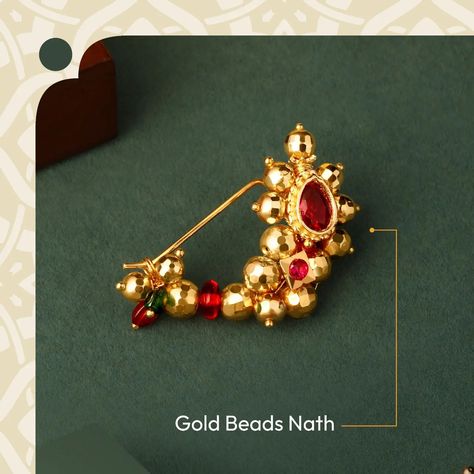 You can never go wrong with a Gold Beads Nath. Our classic and timeless Gold Beads Nath has precious gemstones in the centre surrounded by delicate and elegant gold beads. Captivate eyes on any occasion with our exclusive Nath designs. Visit our store today. #MaharashtrianNath #NathCollection #Nathni #Gold #Jewellery #GoldJewelry #MarathiMulgi #GoldBeads Nathni Designs Gold, Nathni Designs, Nath Designs, Mens Gold Jewelry, Antique Gold Jewelry, Mens Gold, Precious Gemstones, Gold Jewellery, Gold Beads