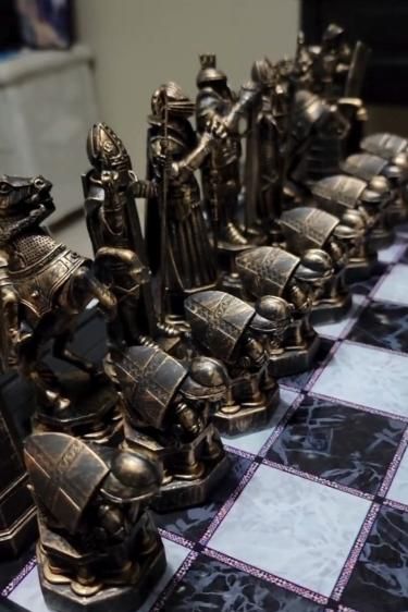 - Exquisite replica of the Wizard Chess set from the Harry Potter series  - Intricately designed chess pieces representing iconic characters from the wizarding world  - Crafted with high-quality materials for durability and authenticity  - Detailed playing board featuring intricate magical symbols and designs Harry Potter Chess Pieces, Harry Potter Set Design, Cool Chess Boards, Wizards Chess, Harry Potter Chess Set, Harry Potter Chess, Wizard Chess Set, Chess Collection, Wizard Chess