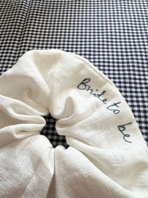 ---- Personalised Bridal Scrunchies ---- Perfect for Hen Dos, Pre wedding day celebrations, gifts for the Bride & even the big day itself!  All Scrunchies are handmade from a beautiful quality of ivory linen and embroidered with a personalised message of your choice! Get in touch if you have any questions!!  Visit our Shop to see the whole Bridal Range!  All Love Craft Do products are Designed and made by Mother & Daughter Duo Kim & Jasmine.  To follow our journey please follow us on instagram @ Hen Party Gifts For Bride, Hen Do Gifts For Hens, Bride Gifts Bachelorette Party, Mother Of The Bride Wedding Gift, Future Bride Gifts, Pre Wedding Gift For Bride, Diy Bridal Gifts, Best Bachelorette Gifts, Bachelorette Slogans