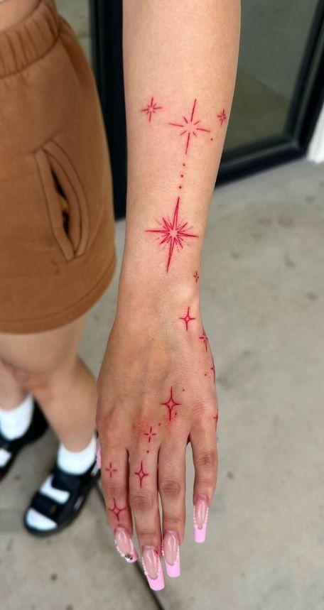 Red And Black Tattoo Ideas For Men, Red Tatoos Woman, Red Hand Tattoo For Women, Back Hand Tattoos For Women, Red Tattoo Hand, Black Red Tattoo Design, Tattoos With Red Ink, Red Tattoos On Dark Skin, Small Tattoo Ideas Women