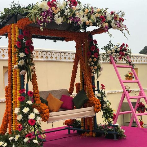 This decor at a terrace function can complete your function look #function #weddingideas #floral #decor #inspiration Mehandi Decor, Dohale Jevan, Mendhi Decor, Haldi Decoration Ideas, Mehendi Decor Ideas, Haldi Decor, Wedding Hall Decorations, Mehendi Decor, Wedding Background Decoration