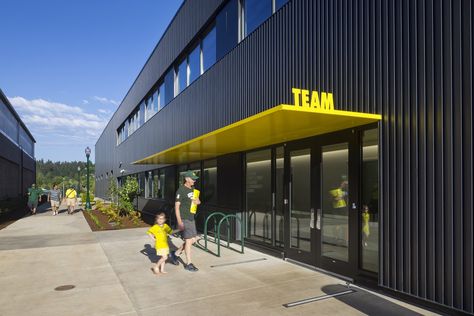 That canopy!  University of Oregon Jane Sanders Stadium | SRG Partnership  Photo © Lawrence Anderson Modal Window, Yellow Umbrella, Industrial Factory, Canopy Design, University Of Oregon, Water Usage, Shade Structure, Oregon Ducks, World Of Sports