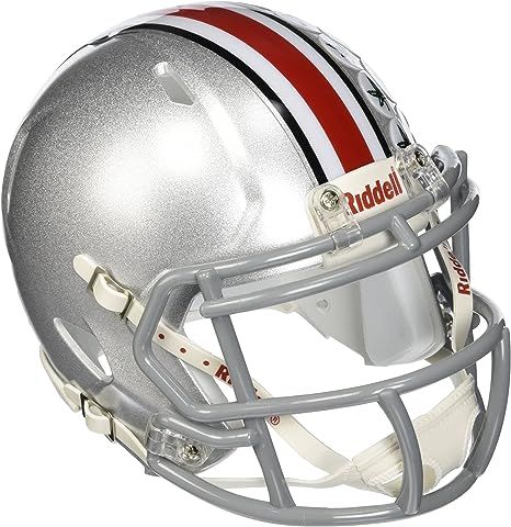 Ideal for autographs. The Speed Mini Helmet is a half-scale replica of one of the most popular new helmet introductions in Riddell's history. The most popular collectible in history is now available in the New Speed Helmet design. Official colors and decals. Includes interior padding and a 4-point chin strap. Ohio State Football Helmet, Ohio State Helmet, Osu Buckeyes Football, Osu Football, Sports Team Apparel, Mini Football Helmet, Osu Buckeyes, New Helmet, Buckeyes Football