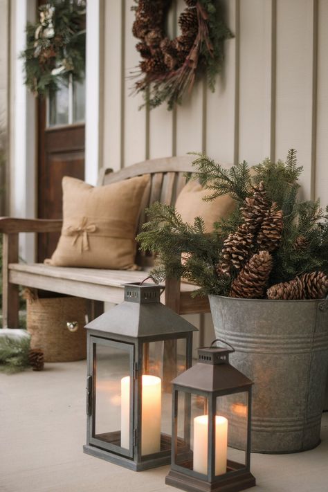 Rustic bench with burlap pillow, pinecone wreath, and lanterns with candles Winter Front Porch Decor, Winter Front Porch, Front Porch Decor Ideas, Old Time Christmas, Small Front Porch, Rustic Bench, Metal Bench, Pinecone Wreath, Front Porch Decor