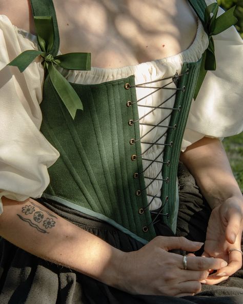 There’s nothing like the peace and quiet of waking up in the countryside. Until the chores pile up of course. But it's always important to take a break and bask in the stillness. ✨✨✨ Find the Artemisia corset at OfWitchesAndBards.etsy.com ✨✨✨ #cottagecore #handmadecorset #customcorset #renaissancefaire #cosplay #costume #everydaywear #strongsupportcorset #shapingcorset #durablecorset #whimsicalfashion #wardrobeststaple #fashionstatement #handmadewithlove #madetoorder #supportsmallbusinesses... Green Academia, Custom Corsets, Peace And Quiet, Overbust Corset, Whimsical Fashion, The Peace, Theme Song, Take A Break, Corsets