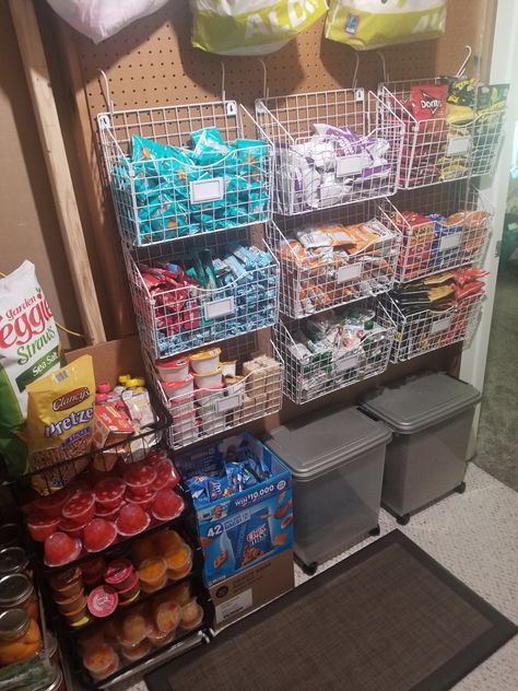 Use hanging baskets and basket carts to organize an easy grab and go system for school snacks and lunches Snack Shack Ideas Concession Stands, Snack Store For Chores, Snack Shack Ideas, Concession Stand Organization, Panty Organization, Diy Pantry Organization, Concession Stands, Dream Pantry, Snack Station