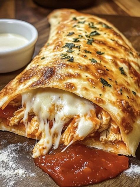 Recipes For you | Bake a golden Chicken Parmesan Calzone in under 45 minutes | Facebook Golden Chicken, Chicken Parmesan, Shredded Mozzarella, Mozzarella Cheese, Parmesan, Mozzarella, Flour, Favorite Recipes, Cheese