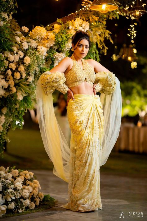 Indulge in the ultimate bridal fashion inspo with our curated collection of Cocktail Outfit Ideas for Indian Brides! From glamorous gowns to exquisite lehengas, explore a myriad of stunning choices to elevate your cocktail look. Get inspired and make a statement on your special day! Mehendi Function Outfit, Cocktail Outfit Ideas, Haldi Outfit For Bride, Udaipur Wedding, Glamorous Gowns, Engagement Gowns, Carnival Dress, Pakistani Formal Dresses, Glamorous Outfits