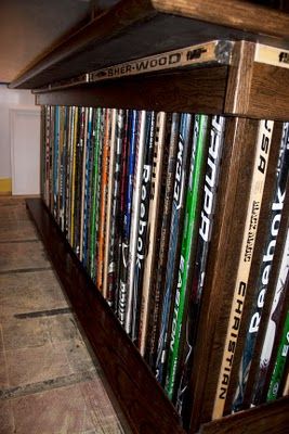 Hockey Haven: The do it yourself basement remodel Small Garage Bar, Small Garage Bar Ideas, Hockey Projects, Hockey Stick Furniture, Hockey Man Cave, Garage Bar Ideas, Bar Remodel, Stick Furniture, Hockey Diy