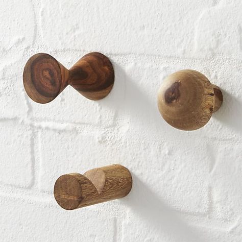 Hang a few strategically placed wall pegs and watch clutter disappear. We particularly like the geometry of these simple wooden versions. Wooden Wall Hooks, Geometric Floor, Hanger Design, Steel Wood, Crate Storage, Sheesham Wood, Product Display, Wooden Pegs, Spare Room