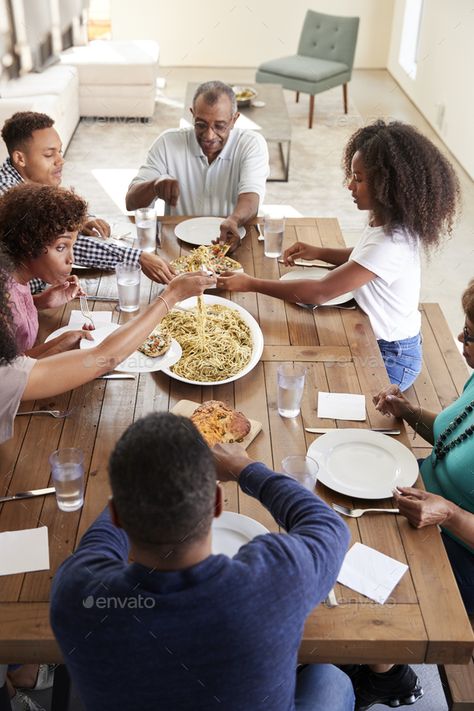 Three generation black family sitting at dinner table eating together, elevated view, vertical by monkeybusiness. Three generation black family sitting at dinner table eating together, elevated view, vertical #Affiliate #sitting, #dinner, #family, #generation Family Sitting At Dinner Table, Dinner Ideas For Family, Eating Together, Family Dinner Table, Dining Room Paint Colors, Family Black, Family Breakfast, Black Family, Eat Together