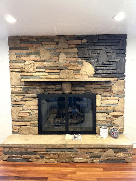 Updating an Old Stone Fireplace With Dark Grey Paint Wash | Before and After – Pine and Prairie Home Stone Fireplace Renovation, Dark Living Room With Fireplace, Painted Stone Fireplace Before And After, Update Stone Fireplace, Old Stone Fireplace Makeover, River Rock Fireplace Makeover, Painting A Stone Fireplace, Painting Stone Fireplace, Paint Stone Fireplace