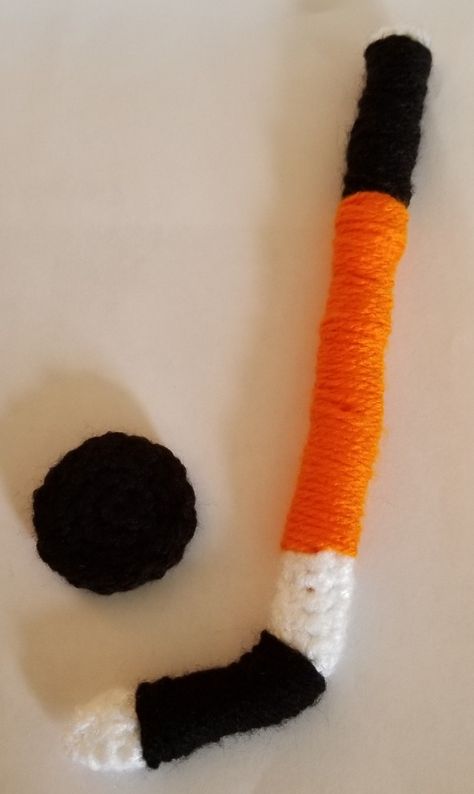 Crocheted Hockey Stick and Puck Crochet Hockey Stick, Ice Hockey Sticks, Hockey Nets, Hockey Ornaments, Neutral Hats, Crochet Football, Hockey Puck, Hockey Stick, Afghan Blanket