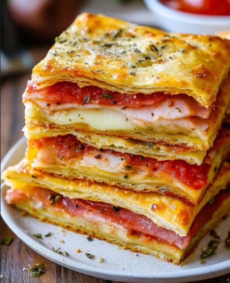 This Squared Antipasto is a delightful twist on traditional antipasto platters, combining layers of savory meats, cheeses, and roasted red peppers all encased in flaky crescent roll dough. Perfect for parties, gatherings, or a cozy family dinner, this dish is both visually appealing and bursting with flavor. With the added richness of a pesto and [��…] Artichoke Crescent Roll Appetizer, Turkey Shaped Antipasto, Baked Antipasto Squares, Italian Sub Squares With Crescent Rolls, Stromboli With Crescent Rolls, Crescent Roll Italian Bake, Antipasto Squares Crescent Rolls, Antipasto Sandwiches, Mozzarella Roll Ups