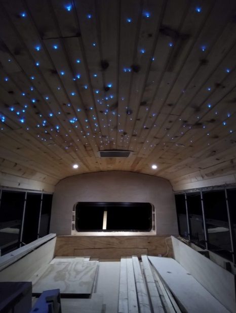 Bus Conversion Ceiling Ideas, Rv Interior Lighting Ideas, Rv Ceiling Ideas, Skoolie Ceiling, Skoolie Design, Fiber Optic Ceiling, Wood Slat Ceiling, Rv Style, Starry Ceiling