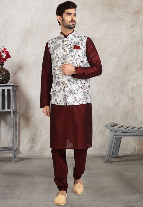 Art Dupion Silk Kurta in Maroon This attire with Satin Lining is Enhanced with Buttons, Digital and Floral Print, Crafted in Chinese Collar Neck and Full Sleeve Available with an Art Dupion Silk Churidar in Maroon and an Art Silk Nehru Jacket in Off White Do note: Footwear shown in the image is for presentation purposes only. Half to one inch may vary in measurement. (Slight variation in actual color vs. image is possible) Kurta Pajama Wedding, Pajama Wedding, Kurta Pyjama With Jacket, Nehru Jacket For Men, Silk Churidar, Sangeet Outfit, Off White Jacket, Men's Ethnic Wear, Kurta Pyjama