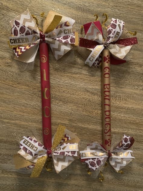 Maroon and Gold Bulldogs spirit sticks cheerleading Spirit Sticks Cheerleading, Cheerleading Diy, How To Make Mums, Cheer Spirit Sticks, Big Homecoming Mums, Spirit Stick, Unique Homecoming Mums, Homecoming Mums Senior, Spirit Sticks