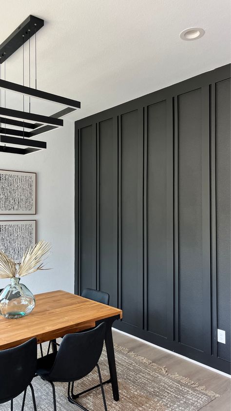 Turn a plain wall into a stunning statement. This accent wall was easy to create and takes the room to another level! House Interior Before And After, Slat Accent Wall Dining Room, Office Black Accent Wall, Black Accent Wall With Windows, Black Paint Accent Wall, Dining Room Black Accent Wall, Painted Wood Accent Wall, Black Focal Wall, Organic Modern Accent Wall