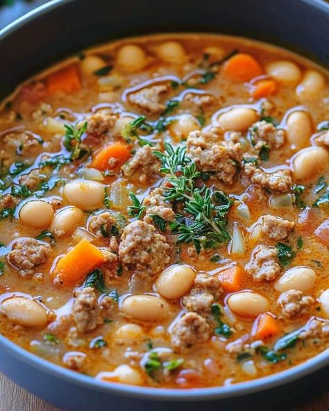 Nonna's Italian recipes Cannellini Bean Soup, Cannellini Beans Soup, Tuscan White Bean Soup, Italian Beans, Tuscan White Bean, Soup Hearty, Spicy Italian Sausage, Sausage Soup Recipes, Cannellini Bean