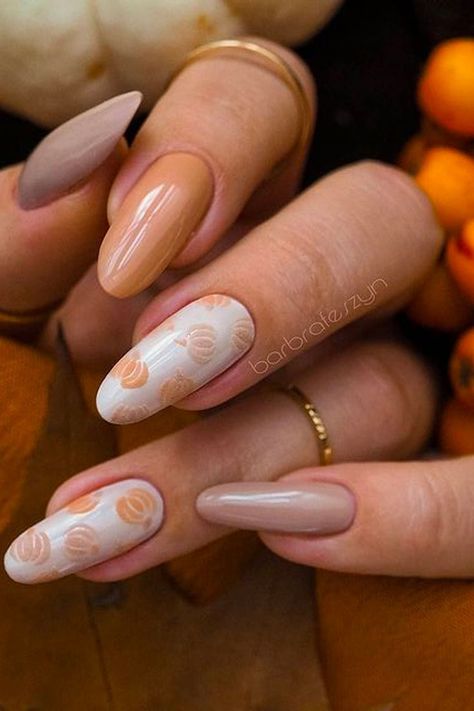 Get ready to embrace the beauty of autumn with our ultimate guide to fall nails! From rich, warm hues like deep burgundy and burnt orange to eye-catching nail art featuring leaves, pumpkins, and cozy patterns, we have everything you need to elevate your manicure this season. Discover trendy techniques such as ombre effects, matte finishes, and glitter accents that perfectly capture the essence of fall. #FallNails #NailArt #AutumnNailDesigns #NailInspiration #SeasonalStyle
https://www.boredpanda. Nude Pumpkin Nails, Neutral Pumpkin Nails, Fall Nails Trendy 2024, Best Fall Nail Colors, Simple Fall Nails, Fall Nail Trends, Pumpkin Nails, October Nails, Happy Nails