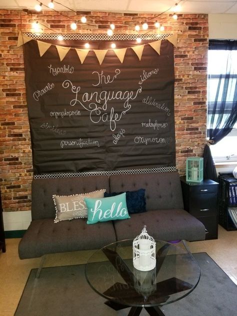 Coffee Themed Classroom Ideas, Cafe Lights In Classroom, Classroom Rustic Decor, Cafe In Classroom, Urban Classroom Decor, Classroom Couch Area, Classroom Decor With Lights, Brick Bulletin Board Ideas, Creative Writing Classroom Decor