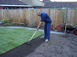 How to Lay Turf - Our Turf Laying Guide How To Lay Turf Landscaping, Laying Turf In Backyard, How To Lay Turf On Dirt, How To Lay Artificial Grass Lawn, Turf Backyard Ideas, How To Lay Turf, Backyard Turf, How To Lay Sod, Laying Artificial Grass