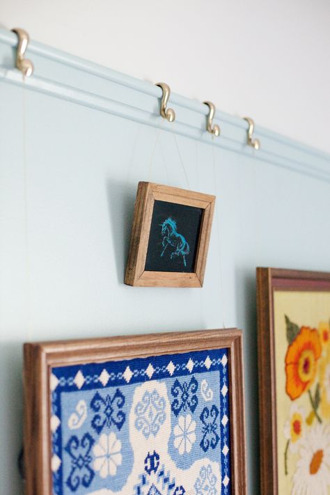 Decorative picture rail moulding adds a touch of character to any space. Click through for tips & a detailed how-to post. How To Make A Picture Rail, Diy Picture Rail Molding, Picture Rail Molding On Walls, Diy Picture Rail, Moulding Diy, Picture Rail Hanging, Art Hanging System, Picture Rail Molding, Picture Rails