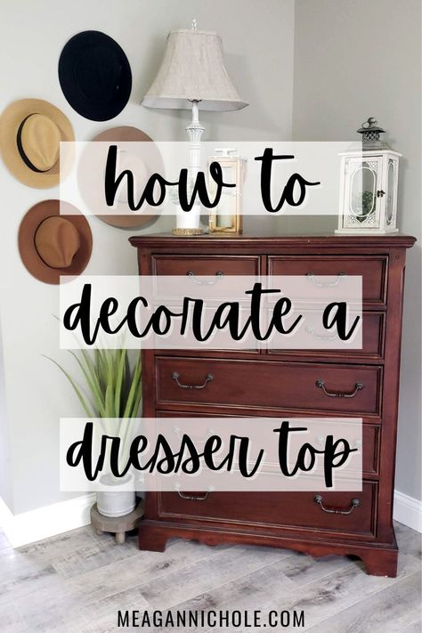 My dresser is always full of junk. That's going to change. Love these decorating tips and tricks! Dresser Decor Bedroom Ideas, Decorate A Dresser Top, Decorate Top Of Dresser, Decorating Dresser Tops, How To Decorate A Dresser Top, Decorate Dresser Top, How To Decorate Dresser, Decorating A Dresser Top, High Dresser Decor