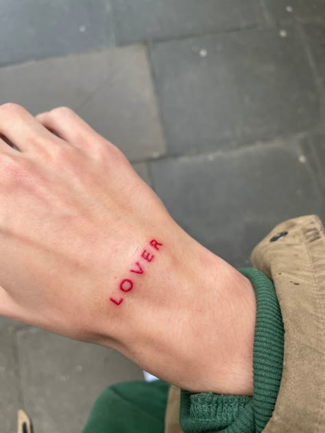 Red Lover Tattoo, Love Yours Tattoo Red Ink, Red Letters Tattoo, Red Letter Tattoo, Wrist Text Tattoo, Small Red Letter Tattoo, Loverboy Tattoo, I Love New York Tattoo, Red Text Tattoo