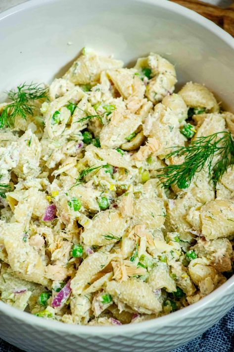 This Cold Tuna Noodle Casserole Recipe turns a classic comfort food into a light and delicious pasta salad loaded with tuna, fresh dill, peas and cheddar cheese! Ready in about 15 minutes! Cold Pea Salad Recipes, Cold Pea Salad, Tuna Fresh, Salad With Peas, Delicious Pasta Salad, Tuna Noodle Casserole Recipe, Pea Salad Recipes, Noodle Casserole Recipes, Tuna Salad Pasta