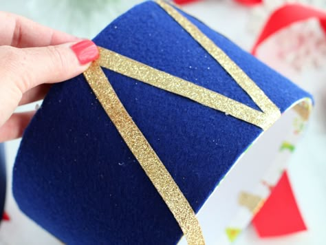 DIY Drum Christmas Gift Box | Fun365 Diy Christmas Drum Ornament, Drum Ornaments Diy, Diy Drum Ornament, Nutcracker Drum Diy, Diy Nutcracker Drum, Christmas Drum Decoration Diy, Drum Centerpiece Ideas, Christmas Drum Diy, Christmas Drum Decoration