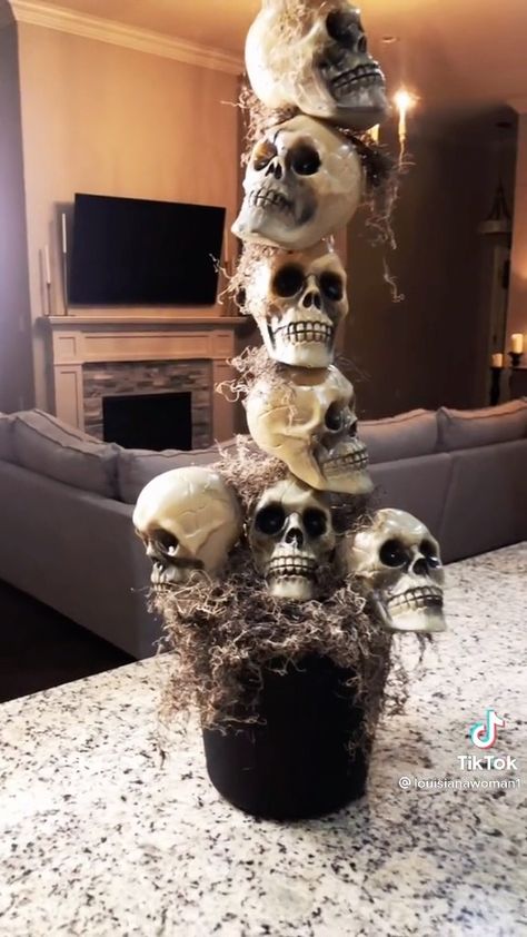 Stacked Skeleton Heads, Dollar Tree Halloween Skull Decor, Dollar Tree Skull Topiary, Dollar Tree Skull Crafts Diy, Dollar Tree Skeleton Diy, Diy Halloween Skull Decorations, Dollar Store Skull Ideas, Dollar Tree Skulls, Skull Topiary Diy