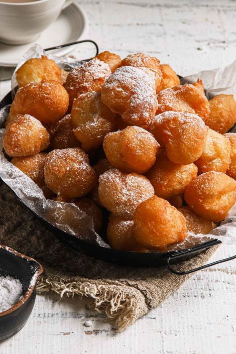 Zeppole are light and airy Italian donuts dusted with powdered sugar. #zeppole #donuts #zeppoledonuts #donutsrecipe #zeppolerecipe #zeppolephotography #italianrecipe #italiandessert Light Airy Donut Recipe, Zeppole Recipe, Italian Donuts, Fried Donuts, Donut Recipe, Choux Pastry, Nut Recipes, Homemade Donuts, Homemade Italian