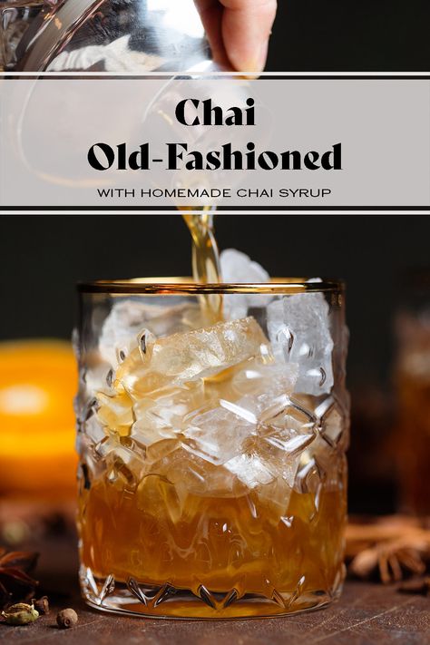 This Chai Old-Fashioned is the perfect fall cocktail! The warming spiced chai syrup also makes it great for the cold winter months and the holidays! The cocktail is made with classic old-fashioned ingredients, homemade chai syrup, and a splash of sparkling water for some fizz. Chai Old Fashioned Cocktail, Spiced Old Fashioned Cocktail, Chai Old Fashioned, Chai Syrup Recipe, Chai Tea Cocktail, Old Fashioned Recipes Cocktail, Chai Cocktail, Chai Syrup, Yum Drinks