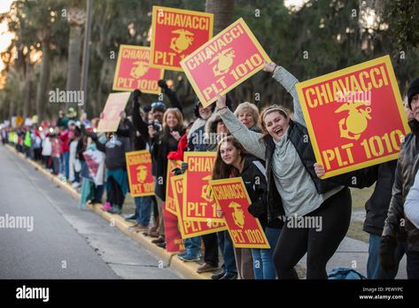 Download this stock image: Family and friends line the streets of Parris Island, S.C., in support of their new Marines during the motivational run of Charlie Company, 1st Recruit Training Battalion, and Oscar Company, 4th Recruit Training Battalion, on Feb. 11, 2016. This was the first chance for most families to get a glimpse of their new Marines in more than 12 weeks. Both companies are scheduled to graduate Feb. 12, 2016. Parris Island has been the site of Marine Corps recruit training since Marine Graduation Posters, Marine Bootcamp, Marine Corps Graduation, Marine Family Day Signs, Marine Graduation, Usmc Bootcamp, Marine Corps Bootcamp, Marine Family, Marine Corps Drill Instructor