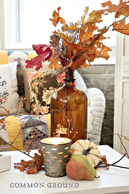 common ground : Amber Glass for Autumn Displays White Wicker Chair, The Garden Room, Olive Bucket, Vintage Grain Sack, Yellow Brick Home, Amber Glassware, Coffee Table Bench, Storybook Cottage, Brown Bottles