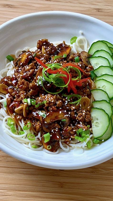 Dan Dan Noodles is a dish from the province of Sichuan, China. The dish name Dan Dan translates to “carrying pole noodles”. The dish was served by street vendors who would carry noodles and sauce on a pole and would serve to order. I came up with this recipe as a hybrid of some traditional techniques and some ingredients that create a lingering heat. Pork is traditional as the meat for Dan Dan Noodles but, chicken or ground beef could be used instead but I recommend keep with pork or chicken Dan Dan Noodles Recipe, Noodles And Sauce, Chinese Noodle Dishes, Street Food Around The World, Dan Dan Noodles, Sichuan China, Street Vendor, Street Vendors, Noodles Recipe