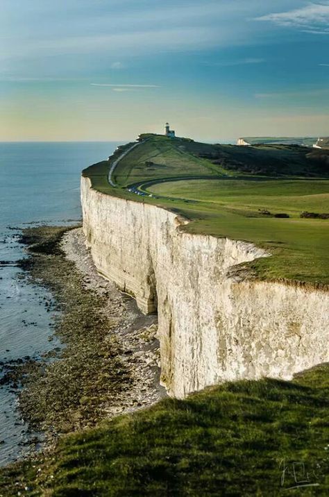 In the South Downs National Park are the cliffs tops of Beachy Head. They are the highest chalk sea cliff in Britain rising to 162 metres above sea level. The peak allows views of the south east coast from Dungeness in the east, to Selsey Bill in the west. The name appears as 'Beauchef' in 1274, and was 'Beaucheif' in 1317, becoming consistently Beachy Head by 1724, and has nothing to do with beach. Instead it is a corruption of the original French words meaning "beautiful headland" (beau chef) Beachy Head, Kentish Town, White Cliffs, Sussex England, East Sussex, English Countryside, England Travel, Oh The Places Youll Go, Amazing Places