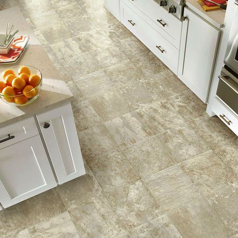 Vinyl is the most popular form of resilient flooring (a category that also includes linoleum and cork) because it’s low-maintenance, water-resistant, cost-effective, and long-lasting. It also has the perfect balance of firmness and “give,” meaning it springs a bit when you walk on it for a comfortable feel underfoot. And thanks to recent technological advances,... Read more » Sheet Flooring Vinyl, Armstrong Vinyl Flooring, Sheet Flooring, Vinyl Sheet Flooring, Cafe Creme, Armstrong Flooring, Vinyl Style, Bronze Bathroom, Wood Tile Floors