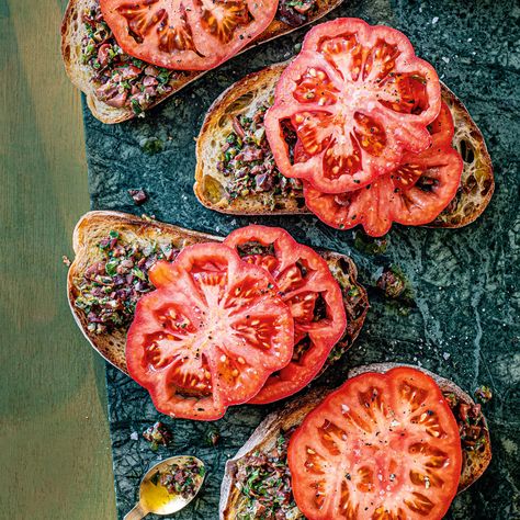 Beefsteak Tomatoes with Black Olive and Orange Tapenade Recipe | Recipes from Ocado Tapenade Recipe, Tomatoes On Toast, Beefsteak Tomato, Olive Tapenade, Pickle Relish, On Toast, Tapenade, Meal Deal, In Season Produce