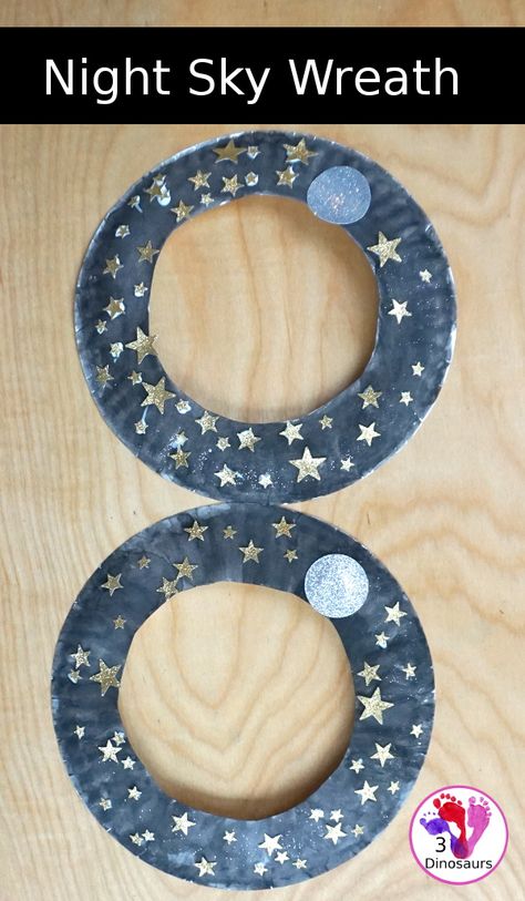 A Fun Night Sky Theme Wreath - make a paper plate wreath with a night sky wreath with a moon and stars - 3Dinosaurs.com #wreathsforkids #nightsky #spacecraft #paperplatewreath #3dinosaurs #craftsforkids Night Sky Wreath, The Sky And Weather Theme Toddler, Night Sky Preschool Art, Night Sky Preschool Activities, Preschool Night Theme, Night Sky Crafts For Kids, Night Crafts Preschool, Light And Dark Activities For Toddlers, Star Crafts For Preschoolers