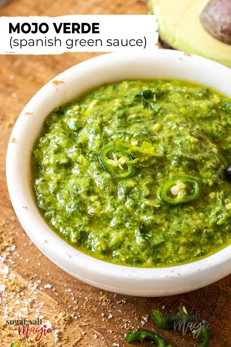 You’re going to want to put this mojo verde (aka Spanish green sauce) on everything, and you just about can. This tangy herb sauce, with a kick of chilli, is fresh and vibrant and perfect on anything from fish and grilled meats to potatoes and tacos. Ahi Verde Sauce, Mojo Verde Sauce, Green Chilli Sauce Recipe, Cuban Green Sauce, Mojo Criollo Recipe, Sauce For Potatoes, Spanish Seasoning, Mexican Green Sauce, Spanish Sauce