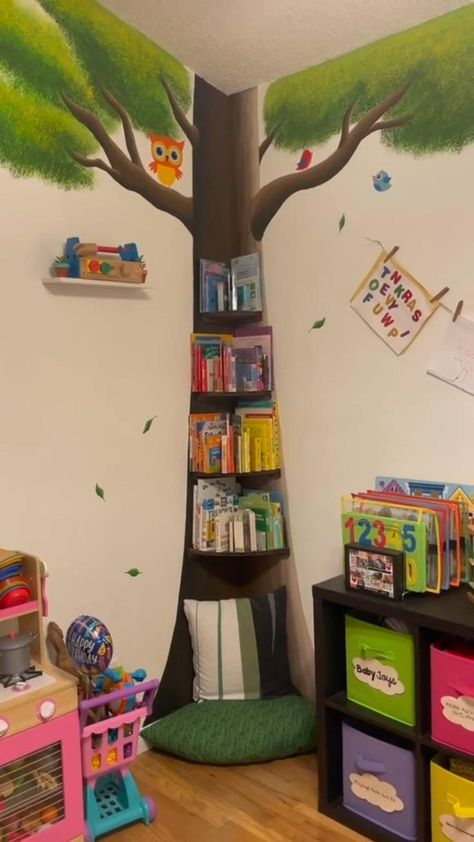 Corner Reading Nook | Daycare decor, Modern kids room, Daycare wall decor Daycare Room Design, Daycare Decor, Daycare Design, Daycare Room, Preschool Classroom Decor, Tree Mural, Playroom Wall Decor, Home Daycare, Playroom Wall