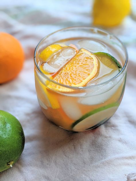 This citrus sangria with white wine is loaded with lemons, limes, and organes. A bright, fruity drink that is perfect for summer. Summer Cocktails For A Crowd, Cocktails For A Crowd, Citrus Sangria, Orange Sangria, White Wine Sangria, Quick Drinks, Grape Soda, Fruity Drinks, Sangria Recipes