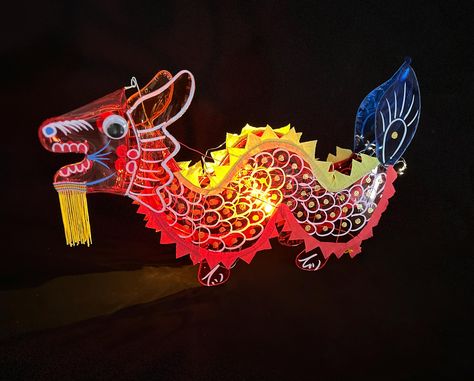 This dragon lantern is handmade, woven with wire, hand-dyed and made of cellophane, and takes 2.5 hours per lantern. Size: 80cm*30cm Dragon Lantern, Beautiful Dragon, Christmas Lanterns, Child Love, Fall Festival, 5 Hours, Nouvel An, Pictures To Draw, Sheet Of Paper