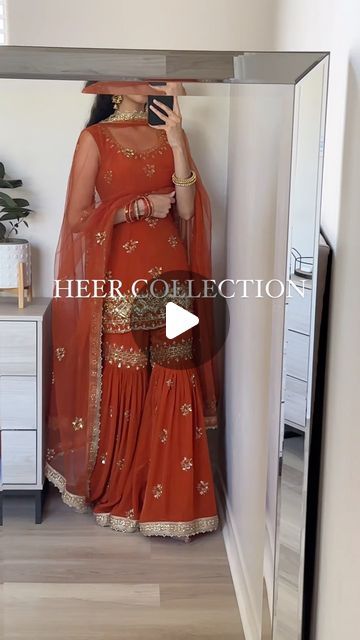 Heer Collection Inc. by Aman Gill on Instagram: "AMORE IN RUST Gharara Set// Rust Orange colored suit with full hand work front and back kameez, gharara and soft net dupatta. How to order/ inquiries: DM, text or email us. Customization: this piece can be made in any color, style or size. #indianwedding #pakistanwedding #desiwedding #kundan #polki #desibride #punjabibride #pakistanibride #desifashion #sikhbride #punjabijutti #phulkari #punjabisuit #jhumkis #punjabiwedding #indianoutfits #shararasuit #pakistanioutfits" Heer Collection Suits, Orange Sharara Suit, Rust Orange Lehenga, Heer Collection, Orange Gharara, Healthy Black Hair, Sikh Bride, Pakistan Wedding, Lehenga Designs Simple