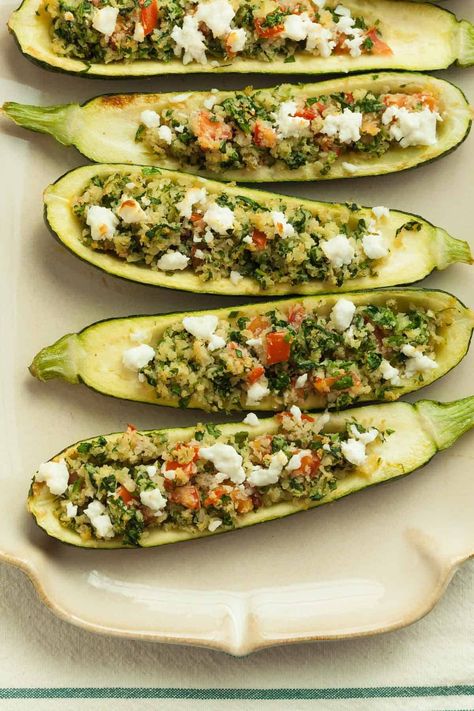 These vegetarian zucchini boats stuffed with a mixture of tomatoes, feta, garlic, herbs and cauliflower rice are fresh with the flavors of the season. Vegetarian Zucchini Boats, Stuffed Zucchini Boats, Zucchini Recipes Healthy, Eat Vegetables, Zucchini Recipe, Stuffed Zucchini, Healthy Zucchini, Zucchini Boats, Feel Good Food