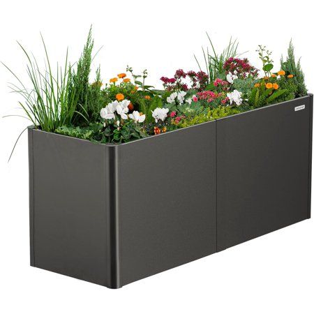 Vego Garden 32" Extra Tall Modern Raised Garden Bed Take your gardening experience to the next level! With a sleek, sturdy design and commercial grade materials, our Modern Raised Garden Bed will make a great addition to any gardeners collection! Double-Walled Panels Maintain the ideal growing temperarture with our double-walled planters - perfect for all plant types. Sleek & Sturdy Modern Design Quick and easy to assemble so you can get right back to gardening! Rounded Corners Our corners are r Patio Herb Garden, Vego Garden, Long Planter, Raised Planter Boxes, Metal Planter Boxes, Garden Modern, Steel Planters, Raised Planter, Metal Planters